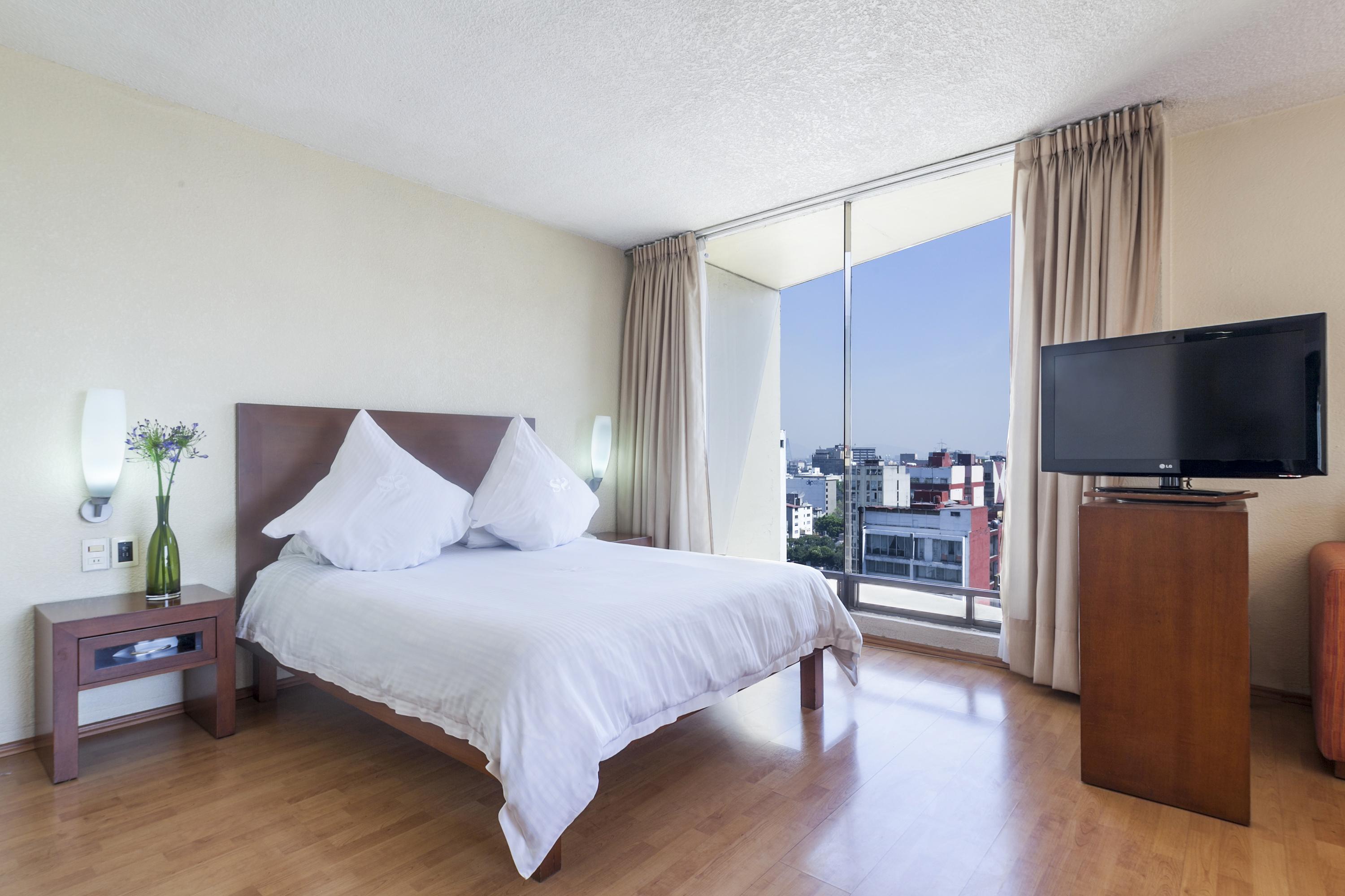Exe Suites San Marino Mexico City Ngoại thất bức ảnh A bedroom at the hotel