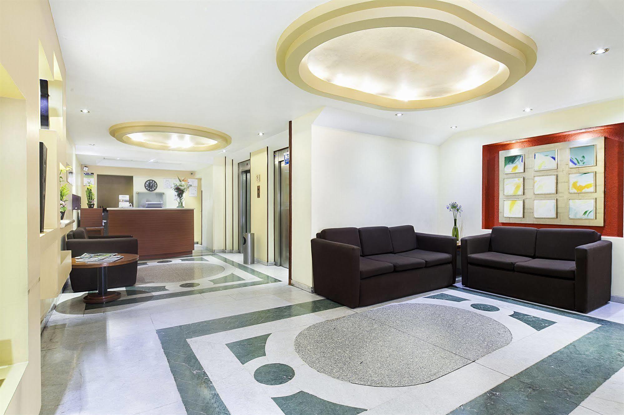 Exe Suites San Marino Mexico City Nội địa bức ảnh Interior of the hotel